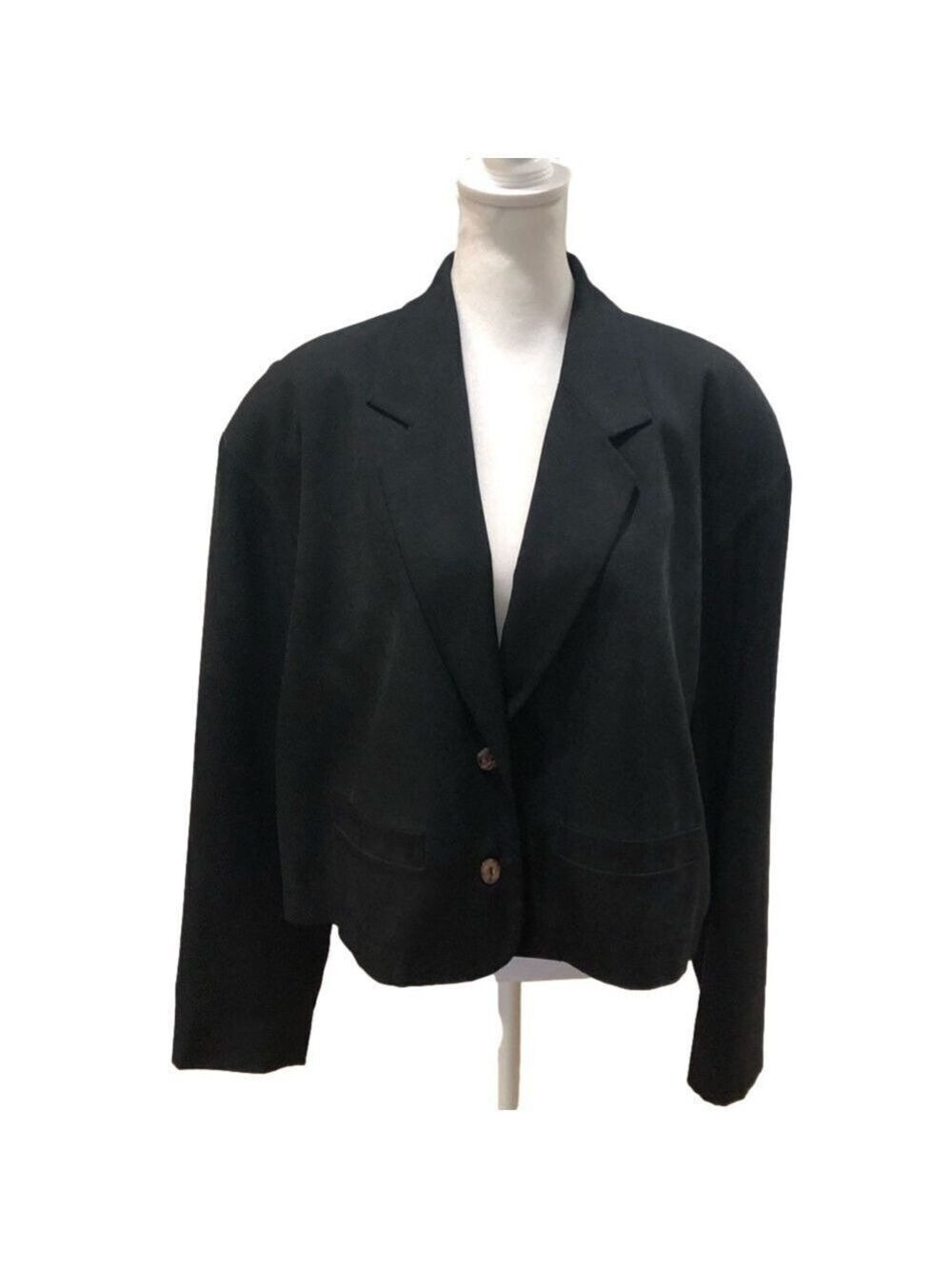 August Silk size 8 black silk cropped ladie’s jacket. Pleated swing back.